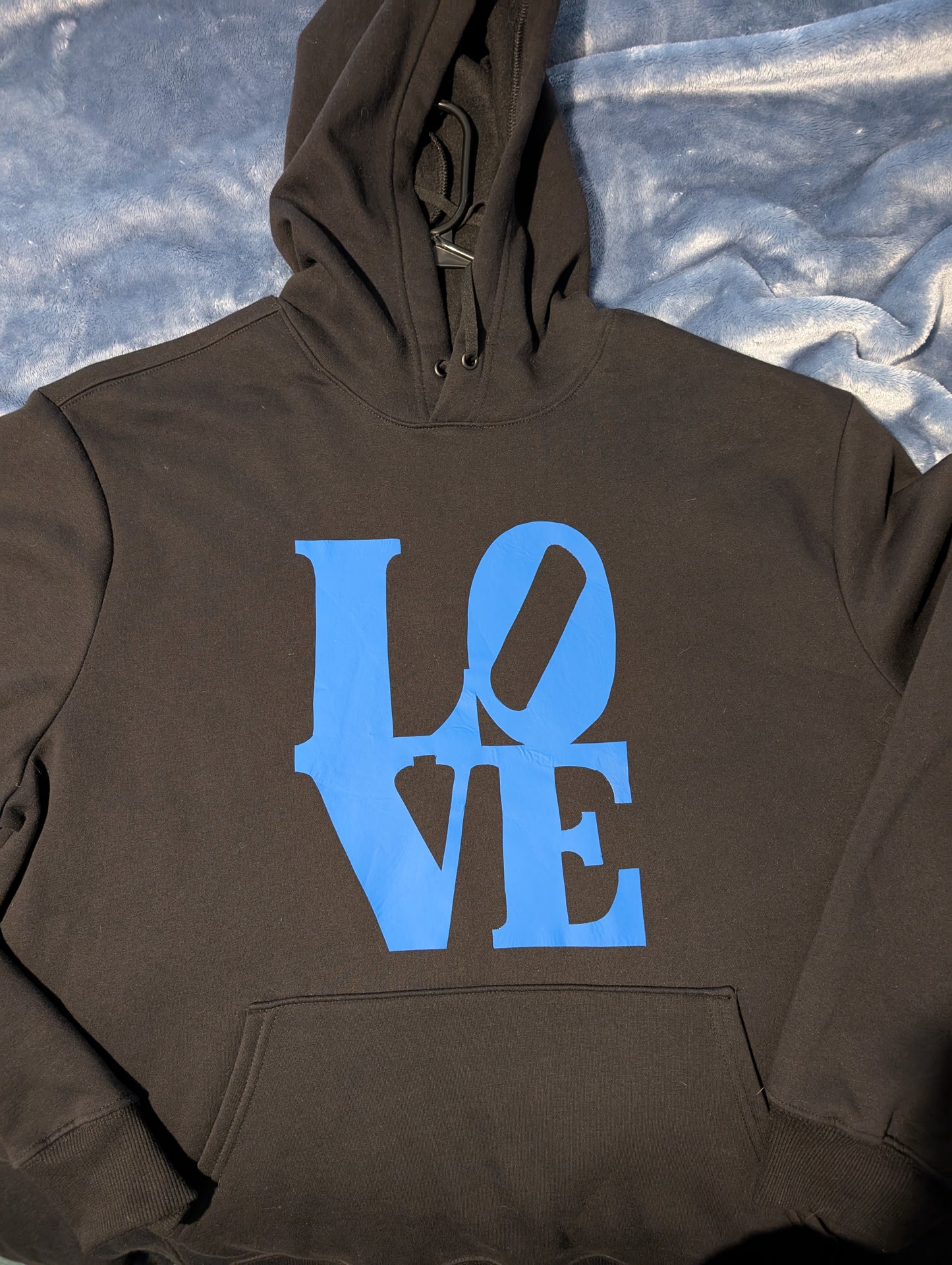 Black hoodie with light blue LOVE writing