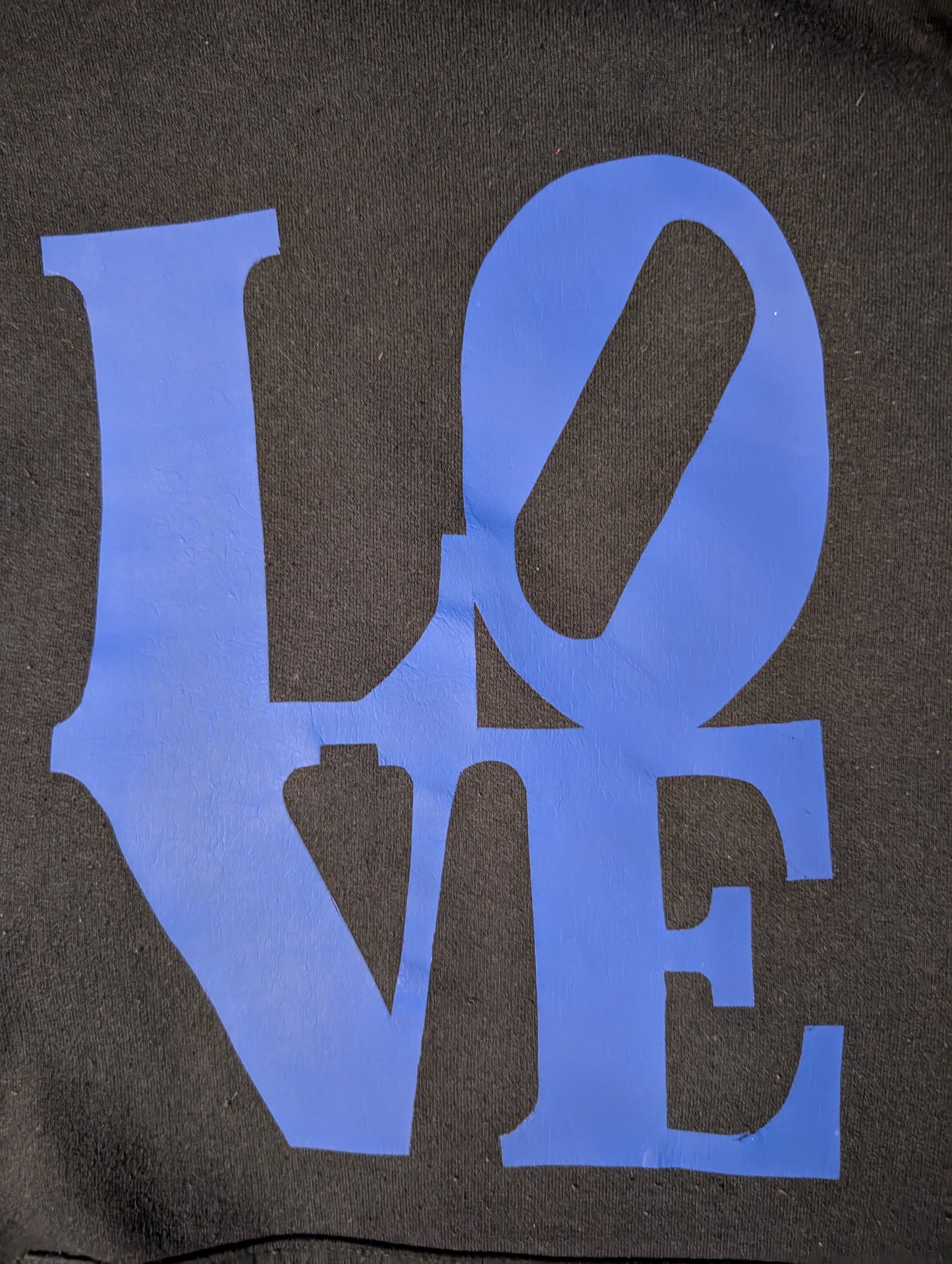 Black hoodie with dark blue LOVE writing